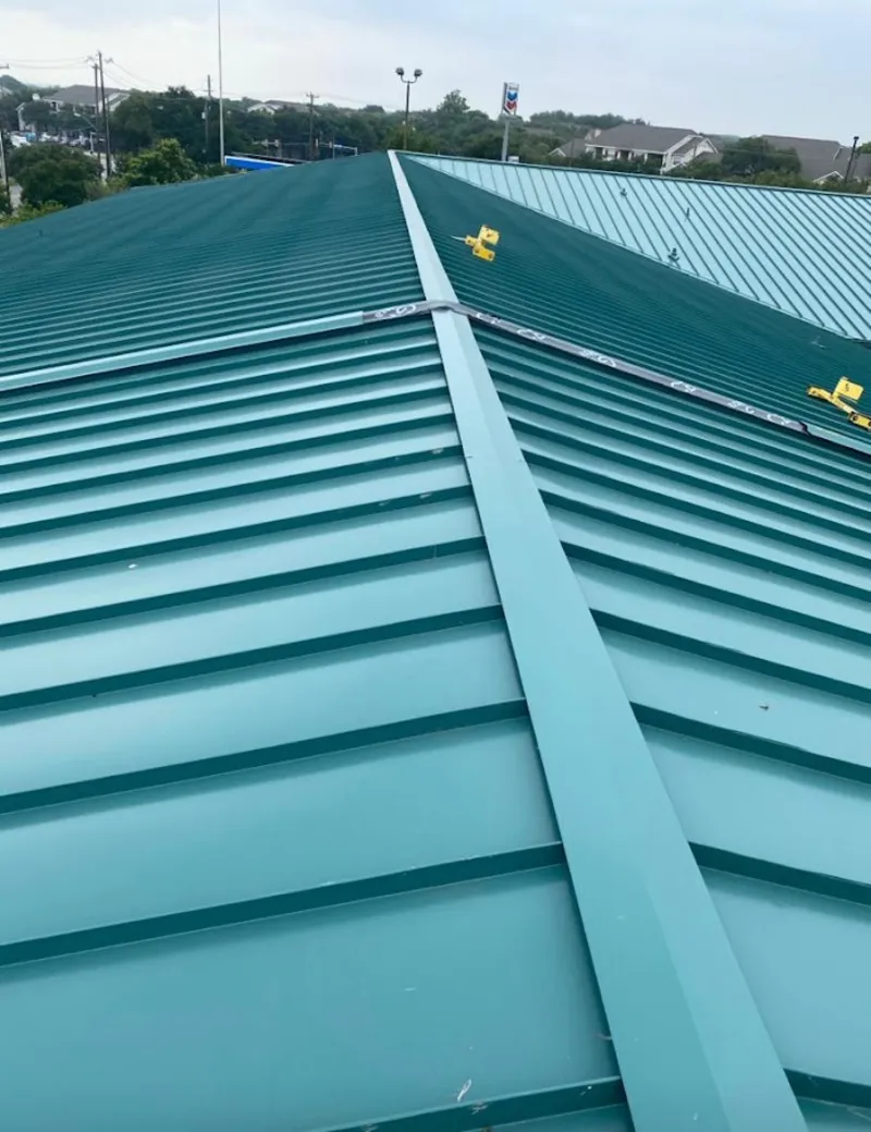 Green commercial metal roof ridge and valley for Metal Roof Repair in Mandan