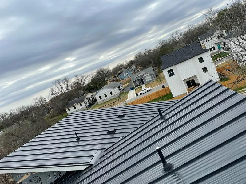 Standing seam metal roof panels with vents for Skylight Repair in Mandan